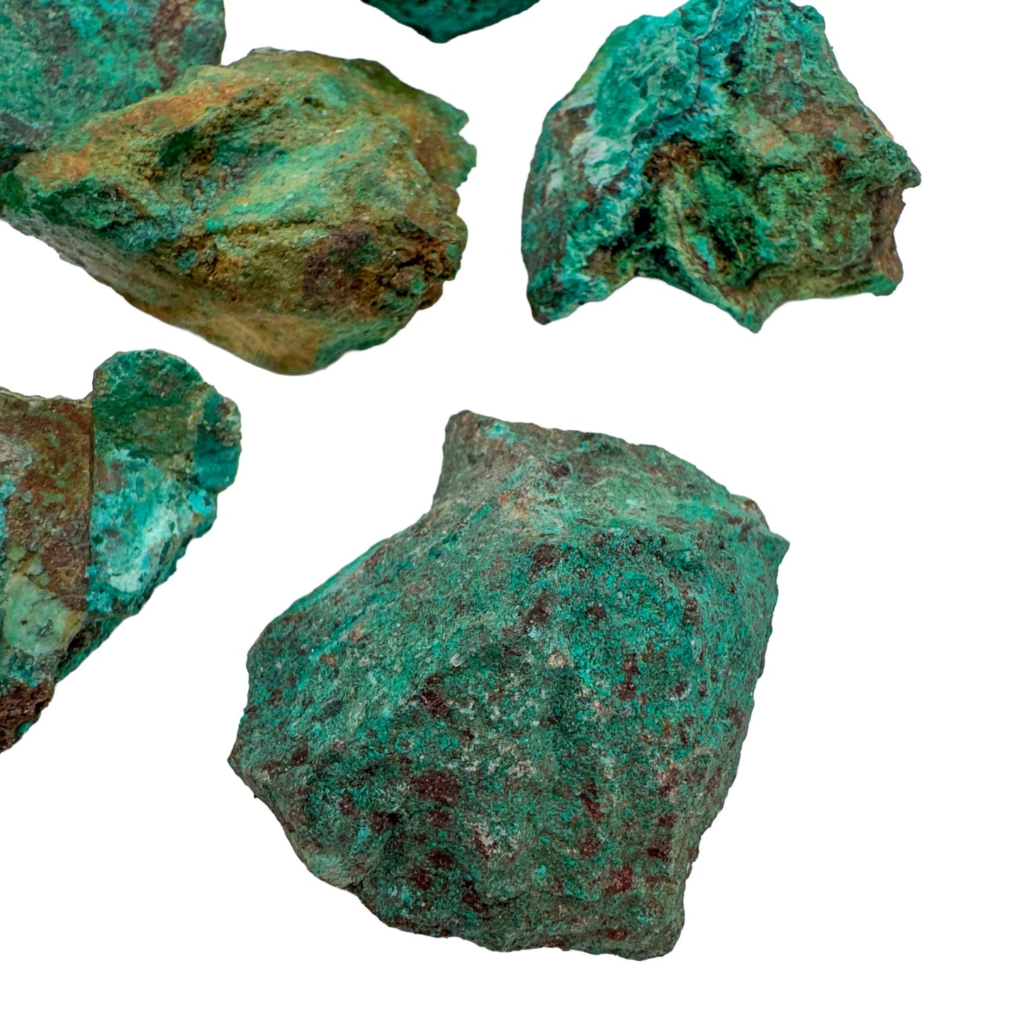 Edge-on view of Chrysocolla raw stone, showing natural sheen.
