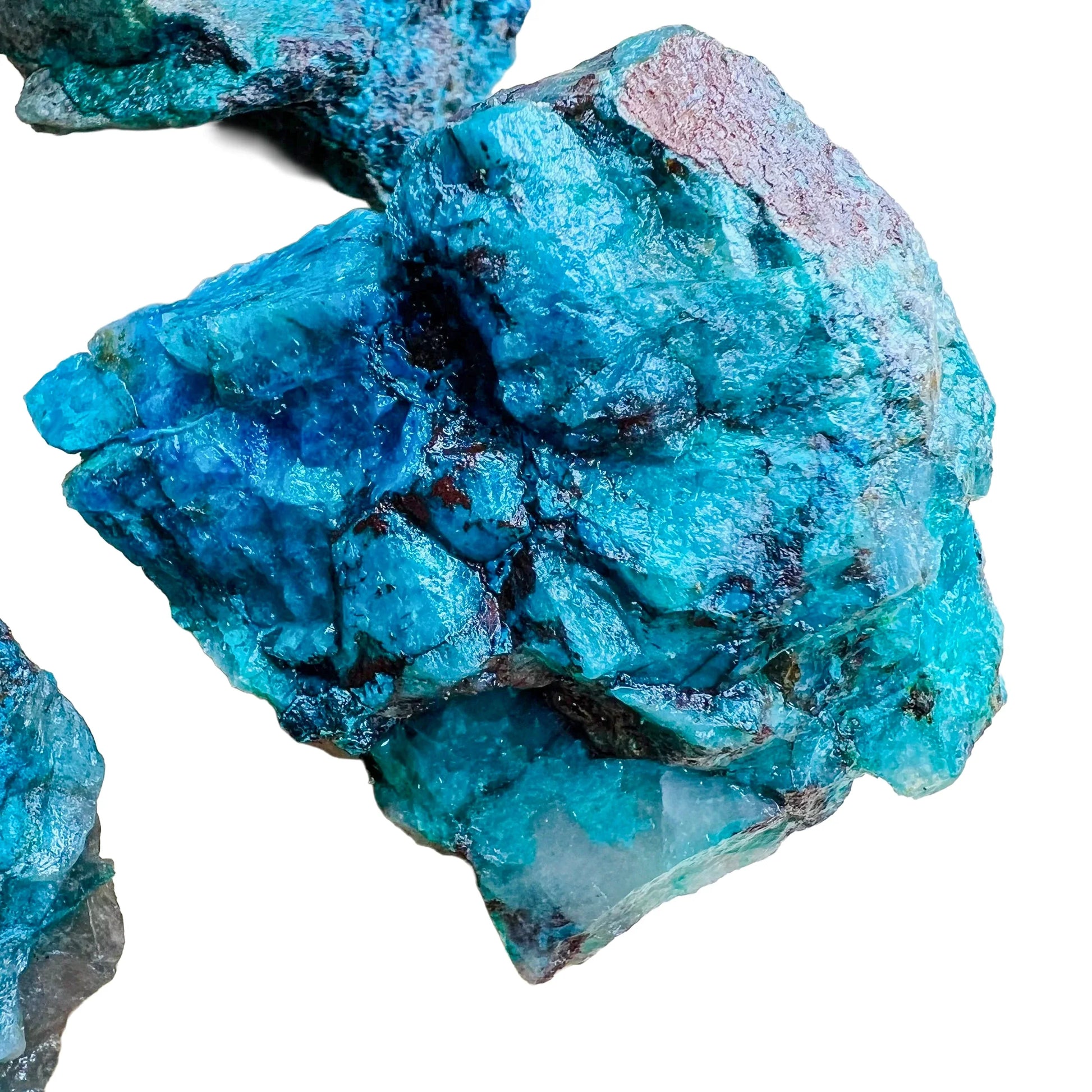 Scale reference of one Chrysocolla raw stone for scale, Namibia-sourced.