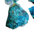 Grade a chrysocolla raw held in hand for size reference