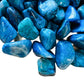 Detail shot showing Grade AA Chrysocolla tumbled stone, showing glassy finish.