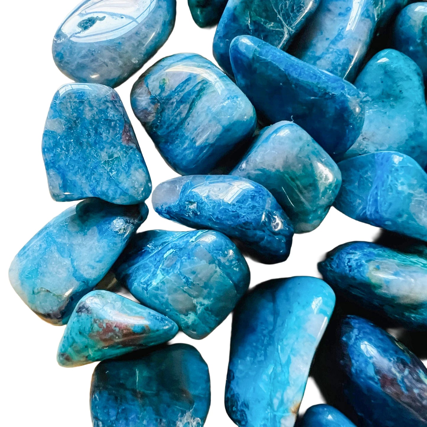 Bird's-eye view of Grade AA Chrysocolla tumbled stone, Namibia-sourced, showing natural sheen.