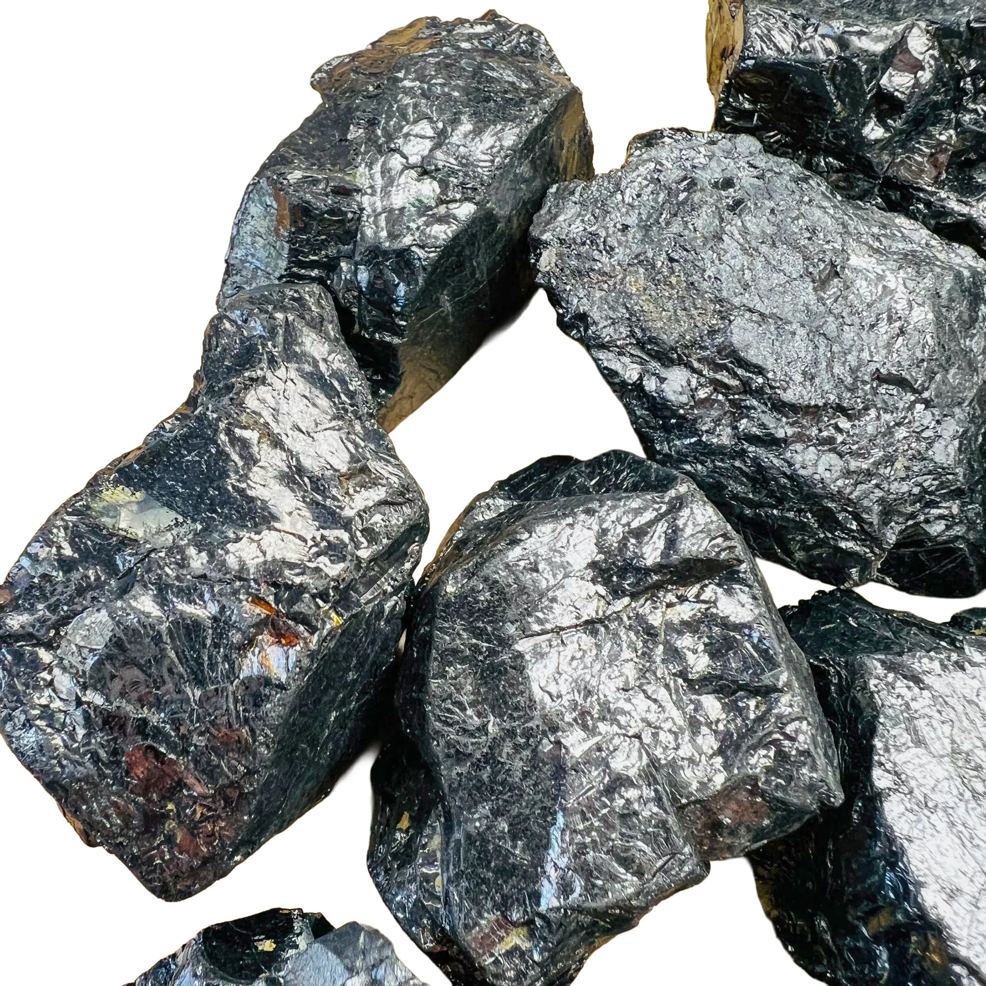 Rear view of Shungite raw stone, sourced from Russia, often paired with practices around Protection.
