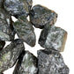 Reverse side of Shungite raw stone, showing natural texture, associated with Protection.