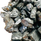 Profile shot of Shungite raw stone, showing natural patina, sourced from Republic of Karélia, Russia.