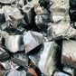 Top-down shot of Shungite raw stone, sourced from Republic of Karélia, Russia.