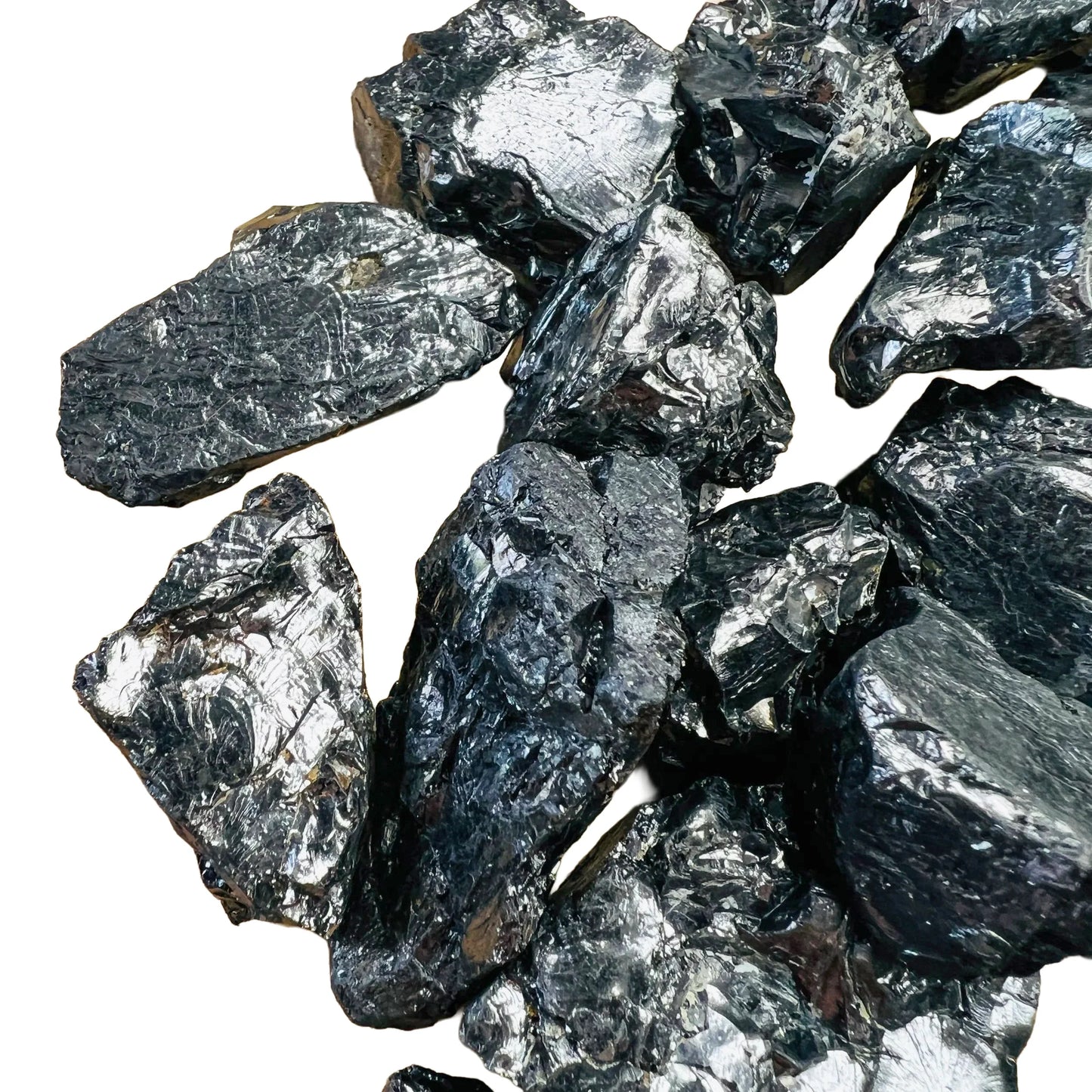 Held in hand, a Shungite raw stone, sourced from Republic of Karélia, Russia.