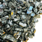 Underside view of black Shungite raw stone, showing natural variation.