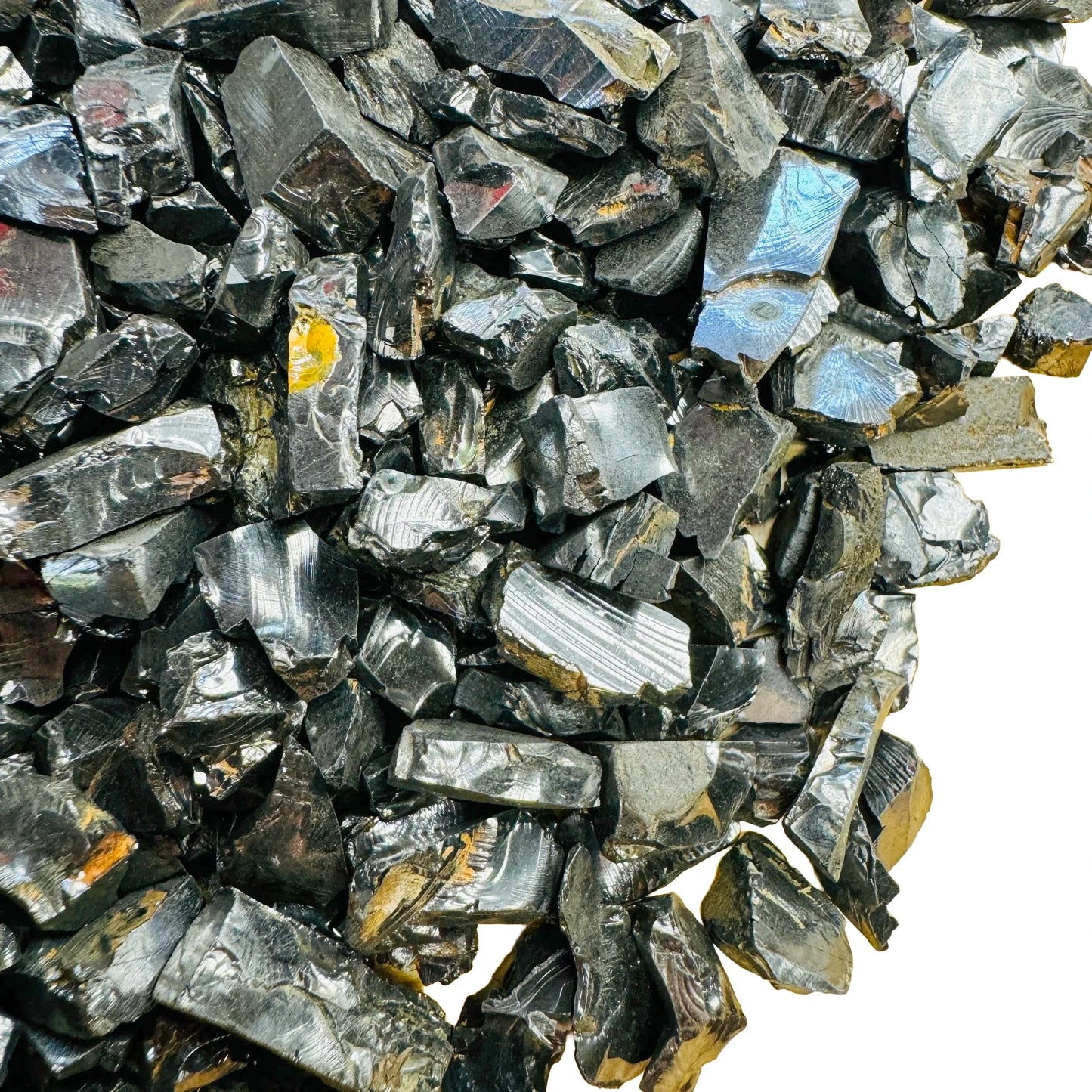 Underside view of black Shungite raw stone, showing natural variation.