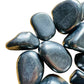 Top view of Shungite tumbled stone, sourced from Russia, traditionally used for Protection.