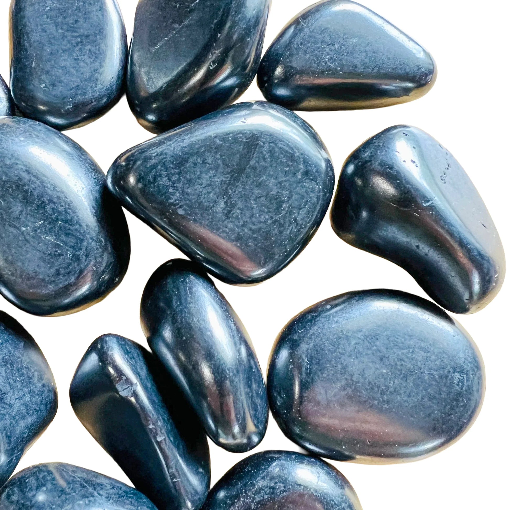 Alternate side of black Shungite tumbled stone, Russia-sourced.