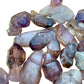 Top angle of Smoky Amethyst raw point, traditionally used for Grounding.