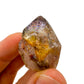 Back view of Grade A Smoky Amethyst point showing natural surface