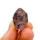 Detail shot of Grade A Smoky Amethyst point under natural light