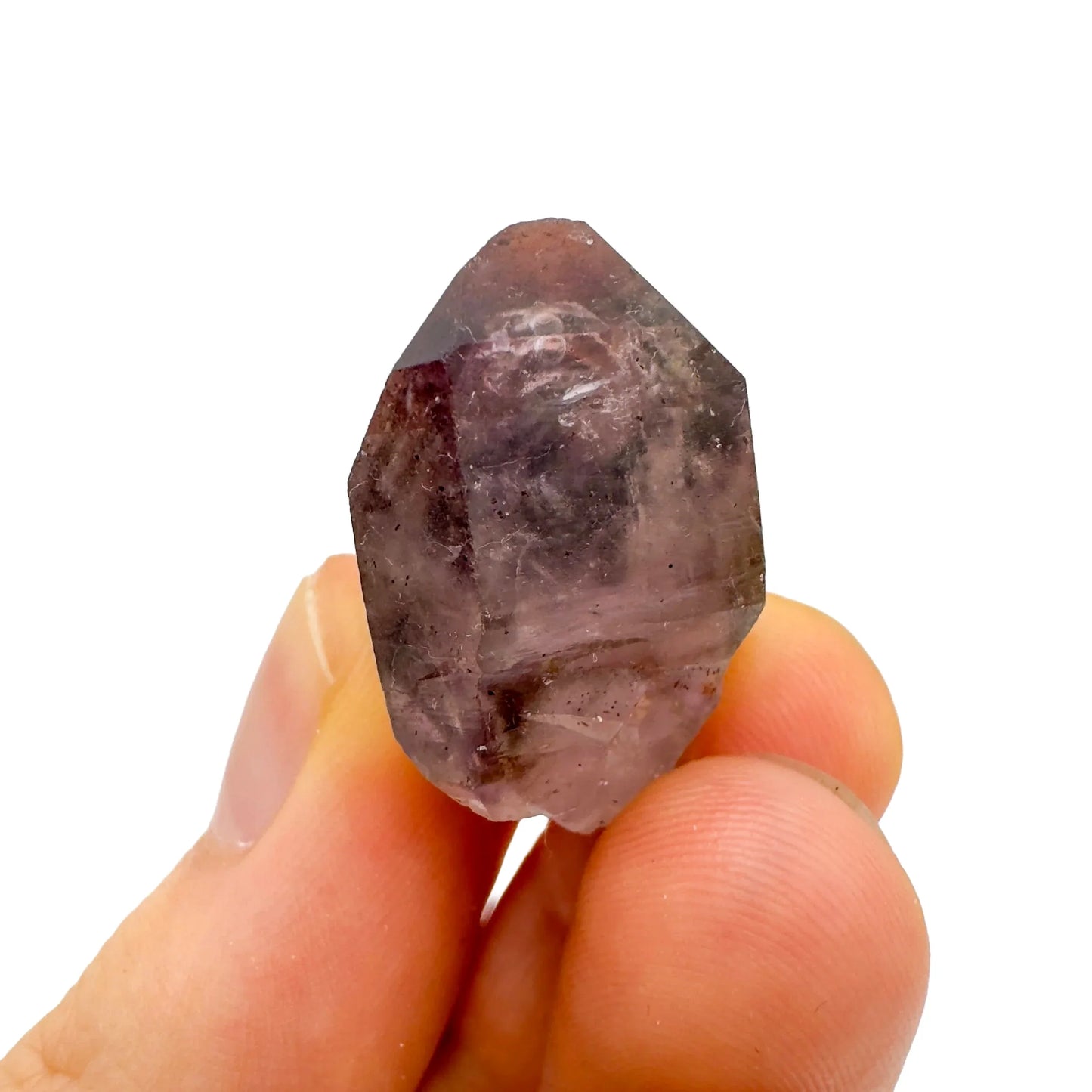 Detail shot of Grade A Smoky Amethyst point under natural light