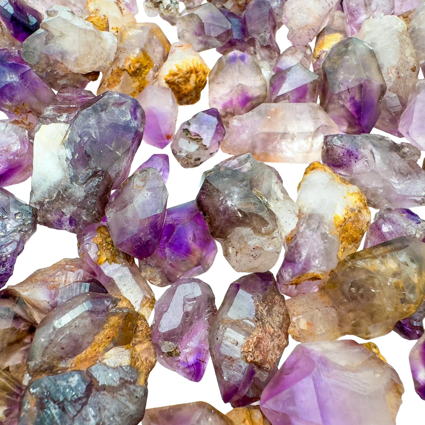 Profile view of Smoky Amethyst raw point, often worked with for Grounding, showing open form.