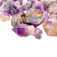 Top view of Smoky Amethyst raw point, showing natural sheen.