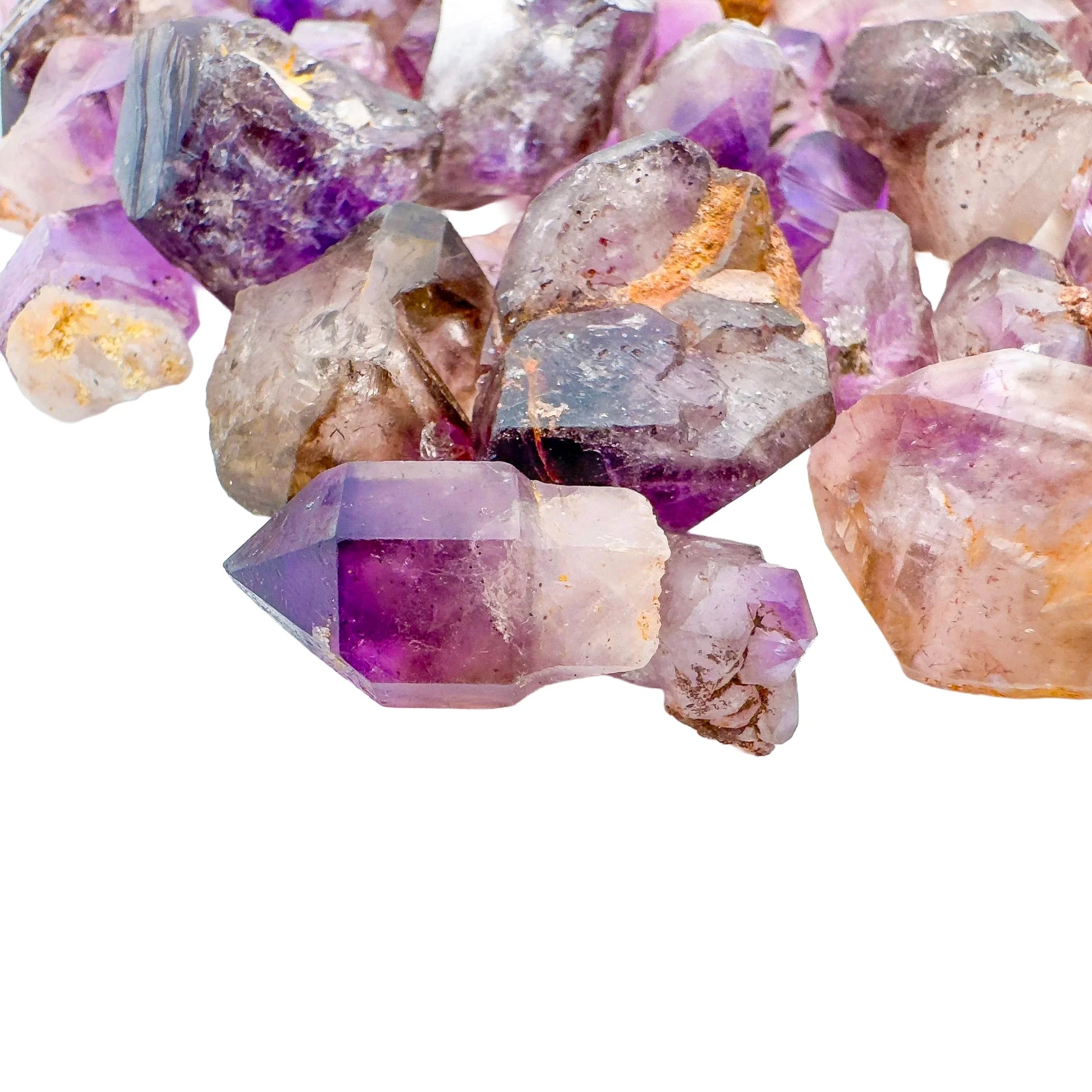 Top view of Smoky Amethyst raw point, showing natural sheen.