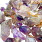 Size comparison with one Smoky Amethyst raw point for scale, Zimbabwe-sourced.