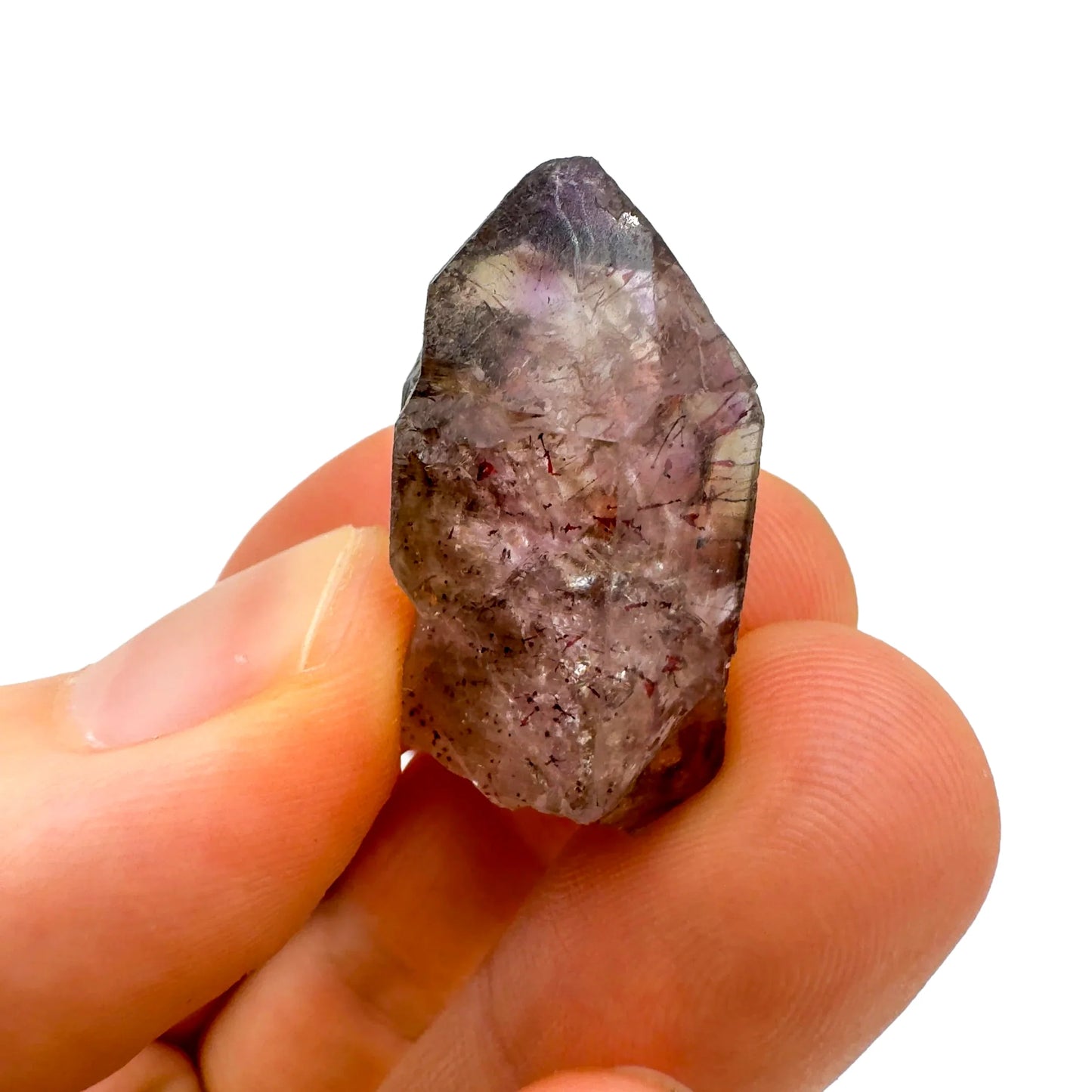 Soft-light view of Smoky Amethyst raw crystal, set to give a sense of weight.