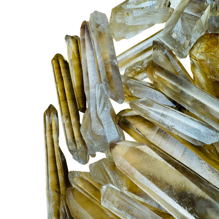 Macro view of Grade AA Smoky Citrine raw point, sourced from Zimbabwe, showing characteristic patterning.