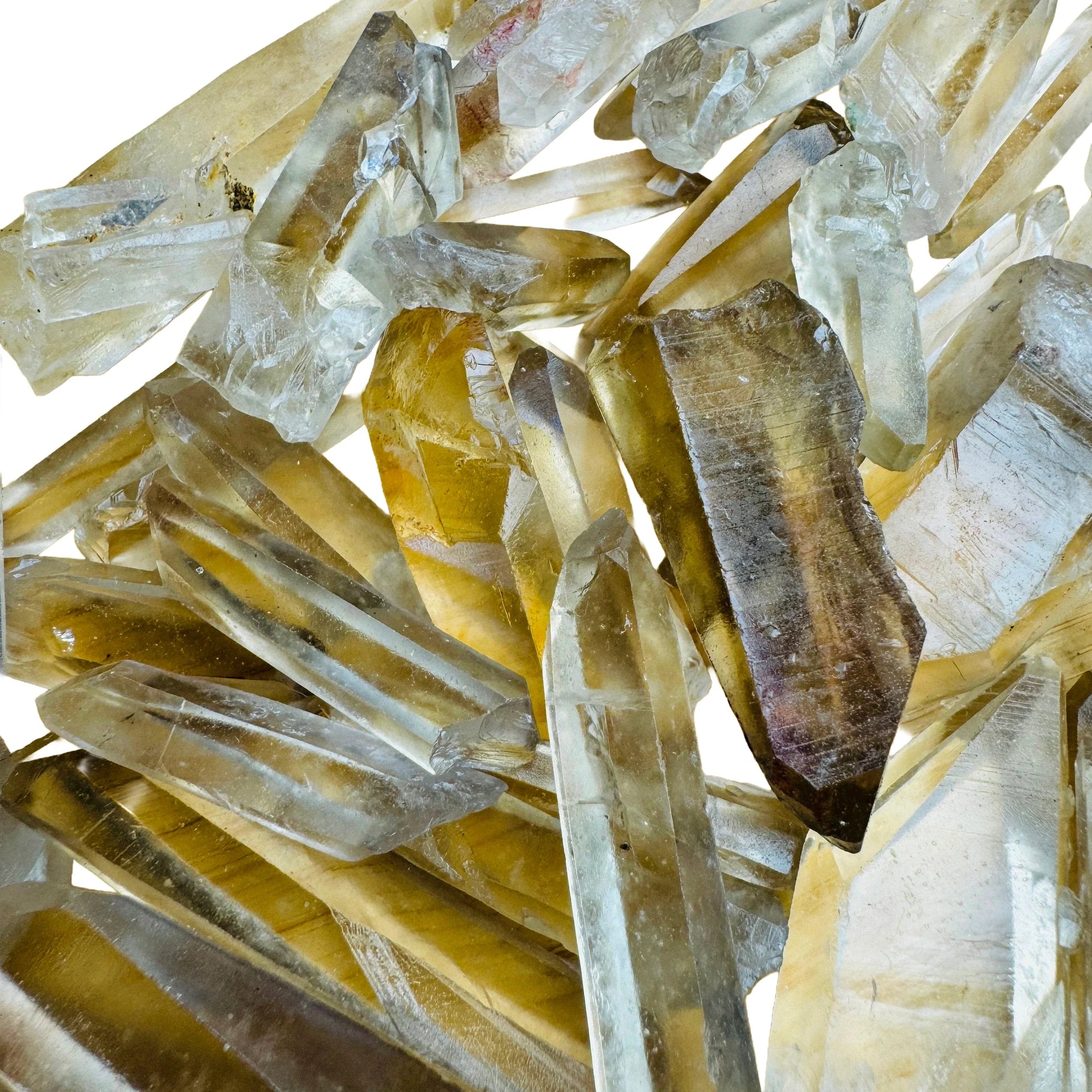 Natural light view of a single Smoky Citrine raw point Zimbabwe-sourced.