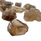 Plan view of brown Smoky Quartz raw stone, showing natural color depth.