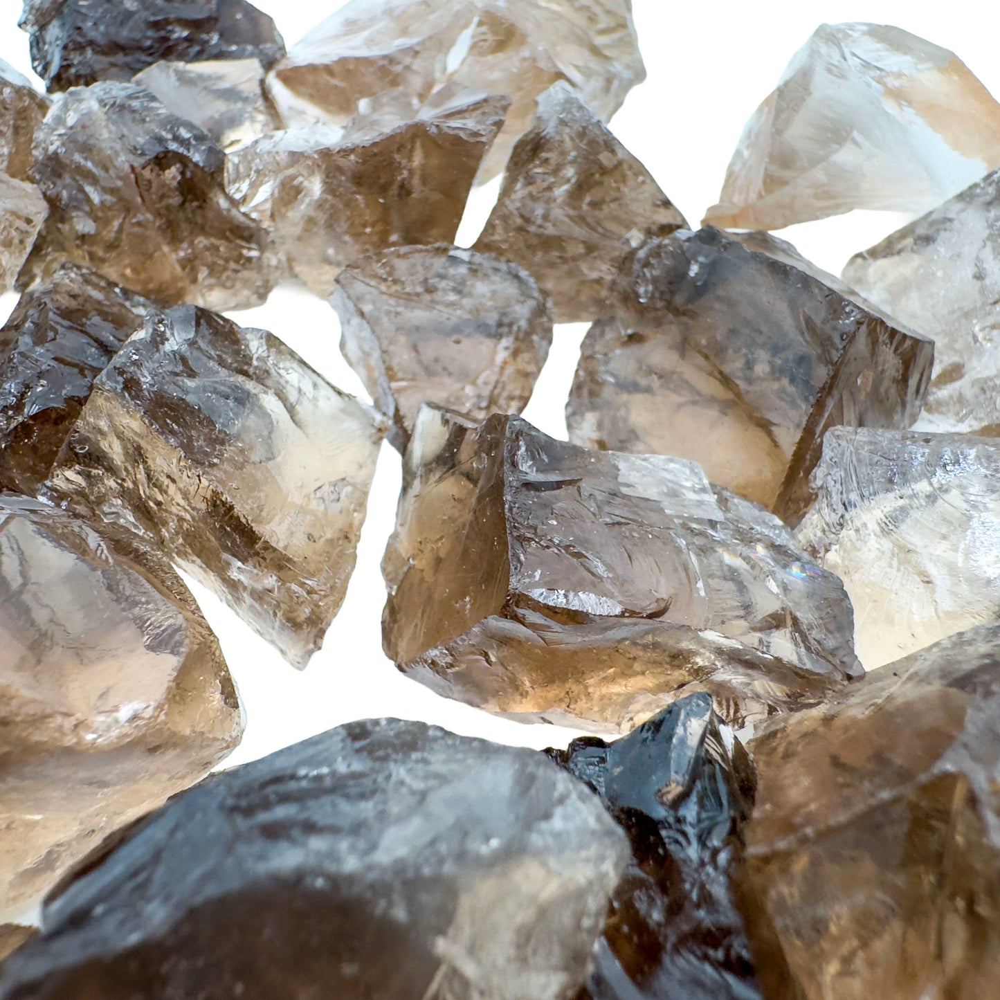 Palm-scale view of a Smoky Quartz raw stone kept near for Grounding.