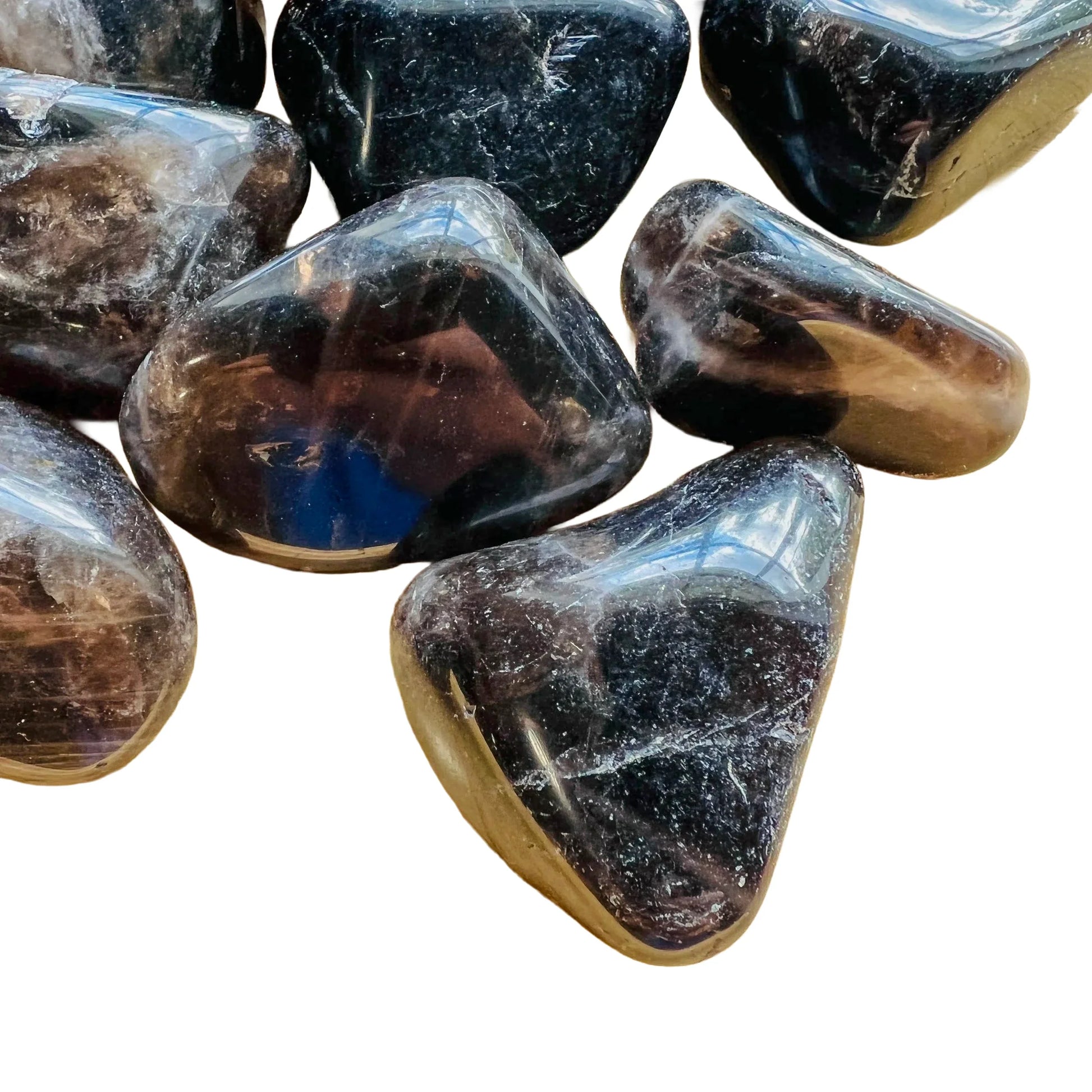 Detail capture of Smoky Quartz tumbled stone, traditionally used for Grounding, Madagascar-sourced.