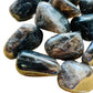 Side profile of Smoky Quartz tumbled stone, drawn on for Grounding.