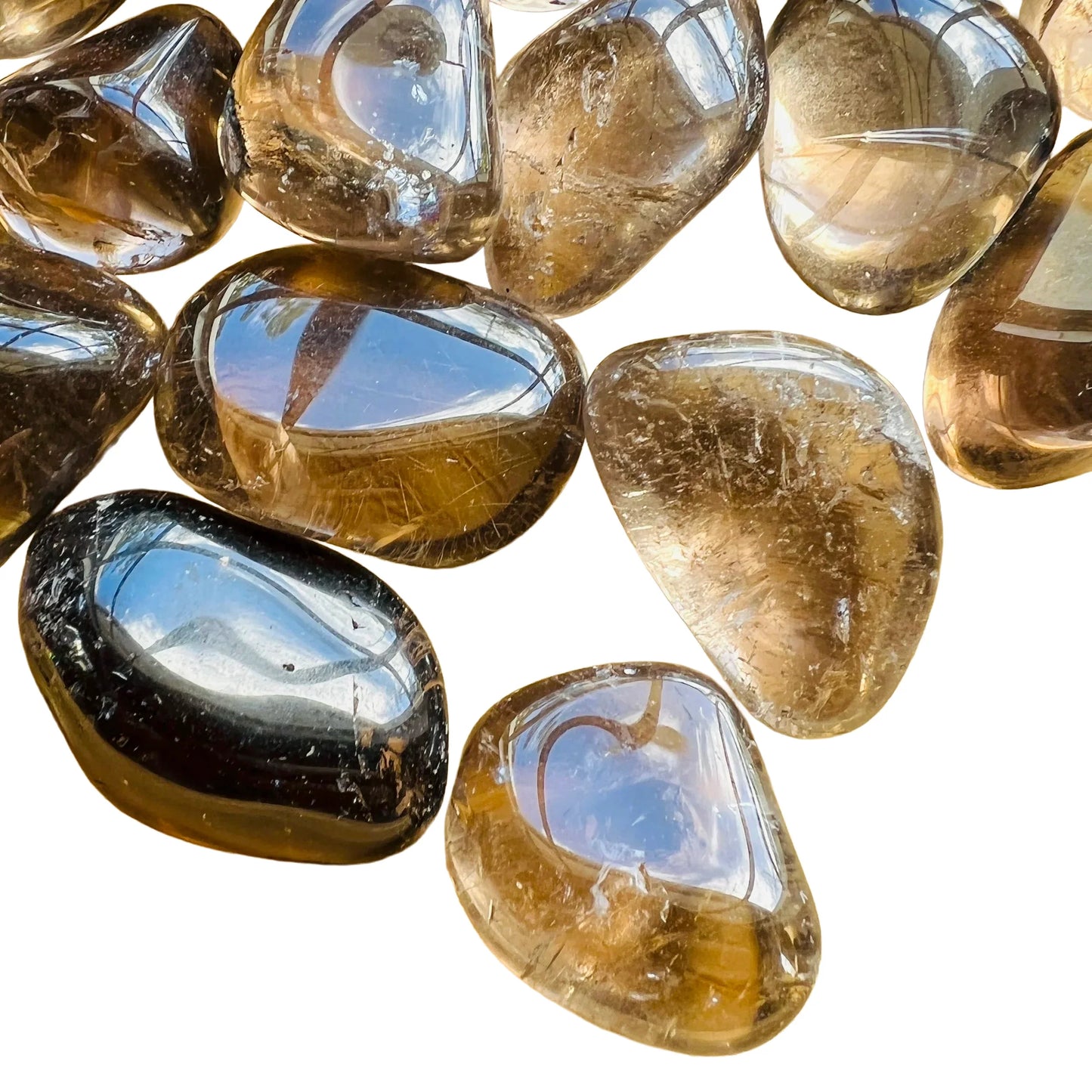 Overhead angle of Smoky Quartz tumbled stone, showing subtle veining.