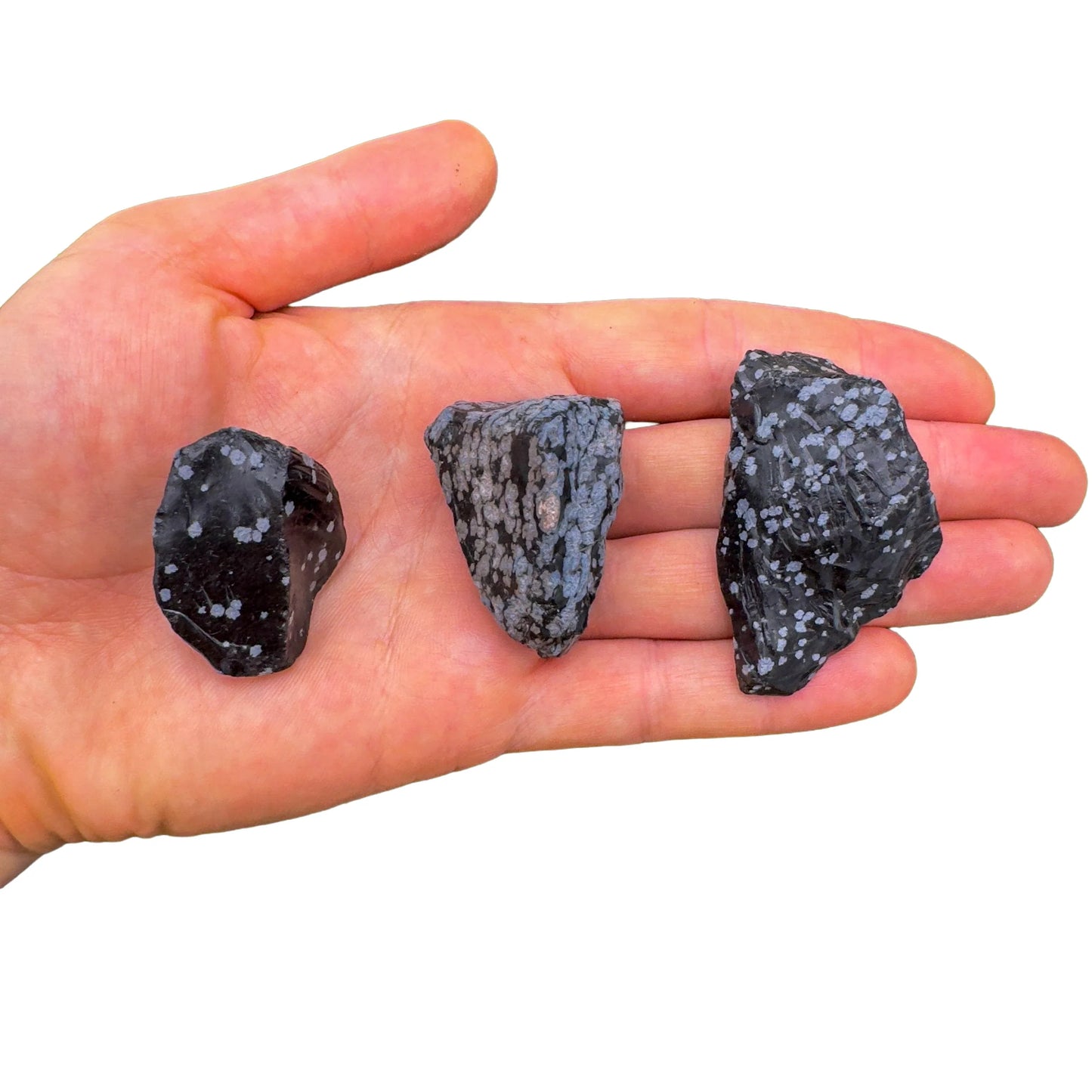 Detail shot of Grade AA Snowflake Obsidian raw under natural light