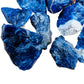 Side angle of Sodalite raw stone, showing raw matrix.