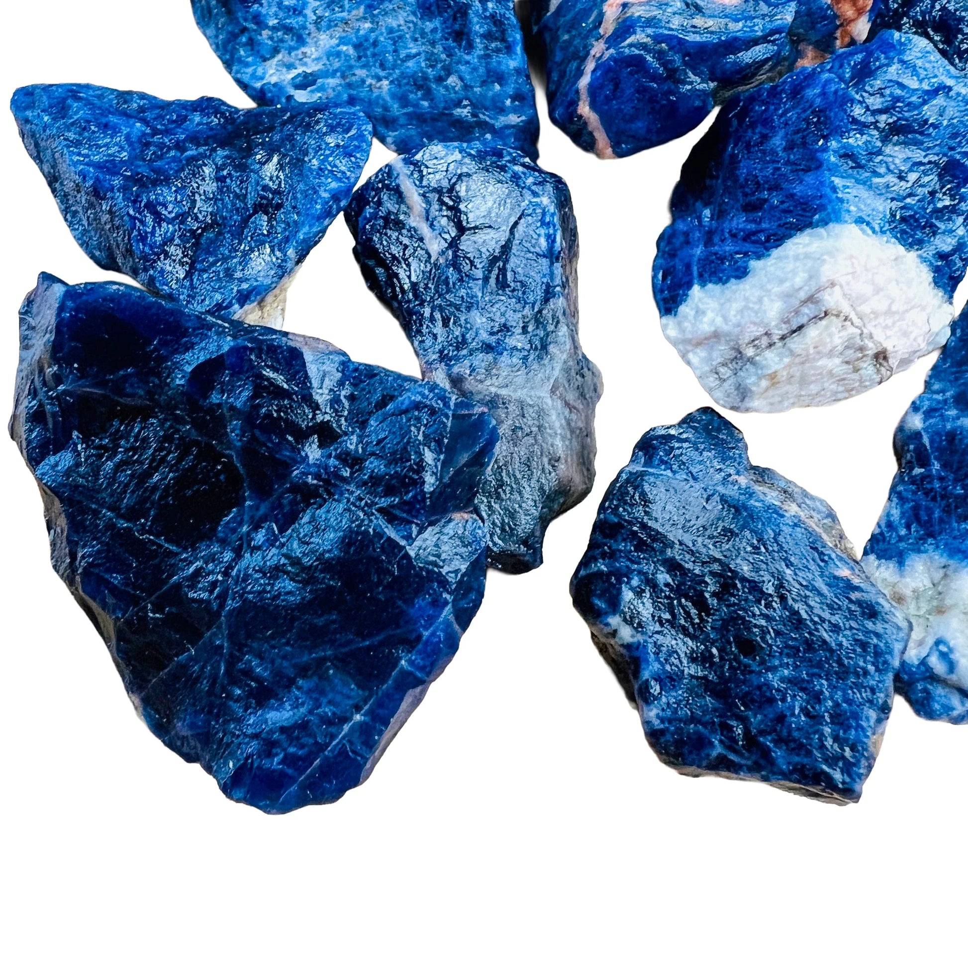Side angle of Sodalite raw stone, showing raw matrix.