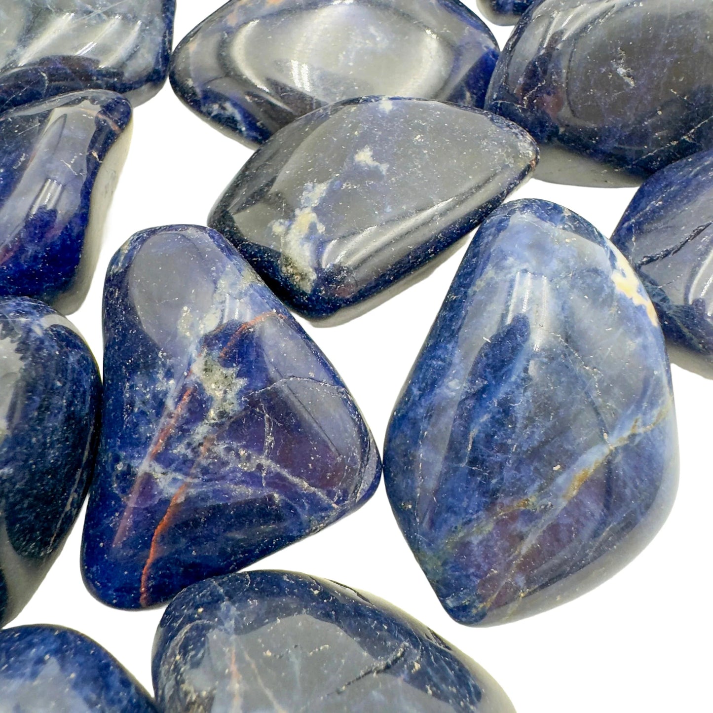 Bird's-eye view of Sodalite tumbled stone, showing translucent edges, from Kunene, Namibia.