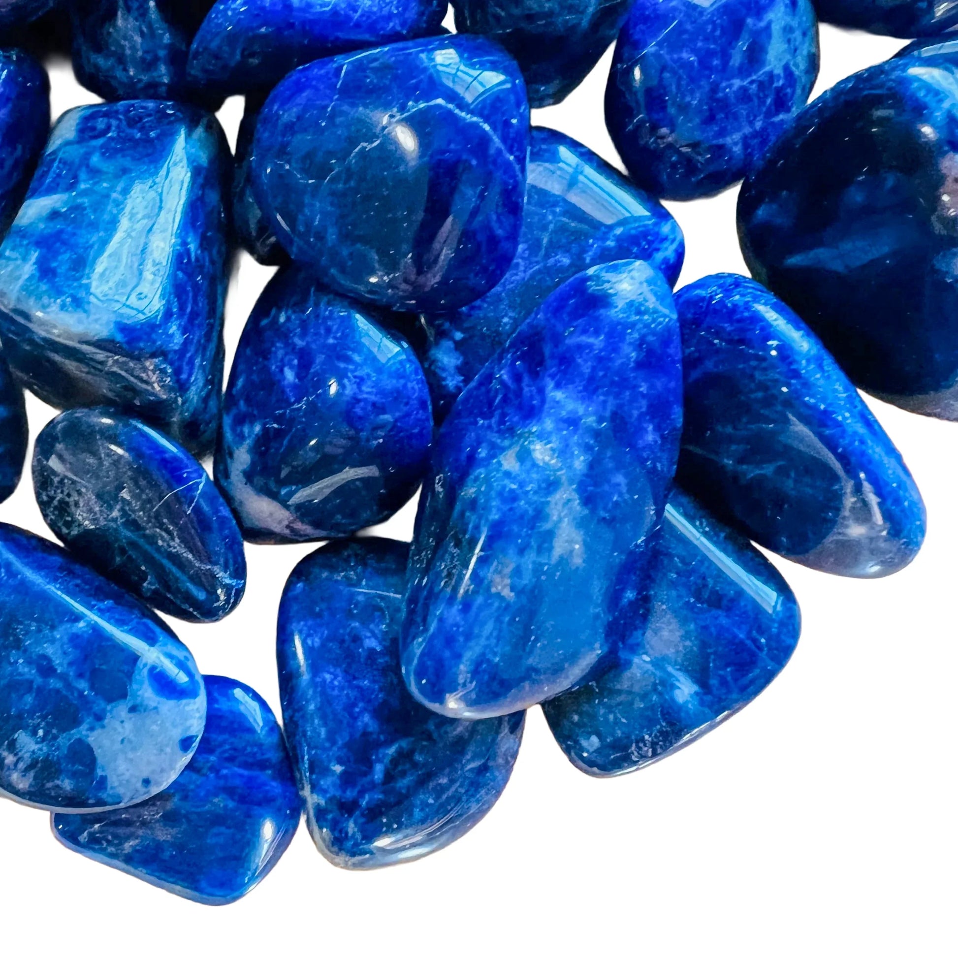 Reverse angle of Sodalite tumbled stone, from Kunene, Namibia, showing natural sheen.