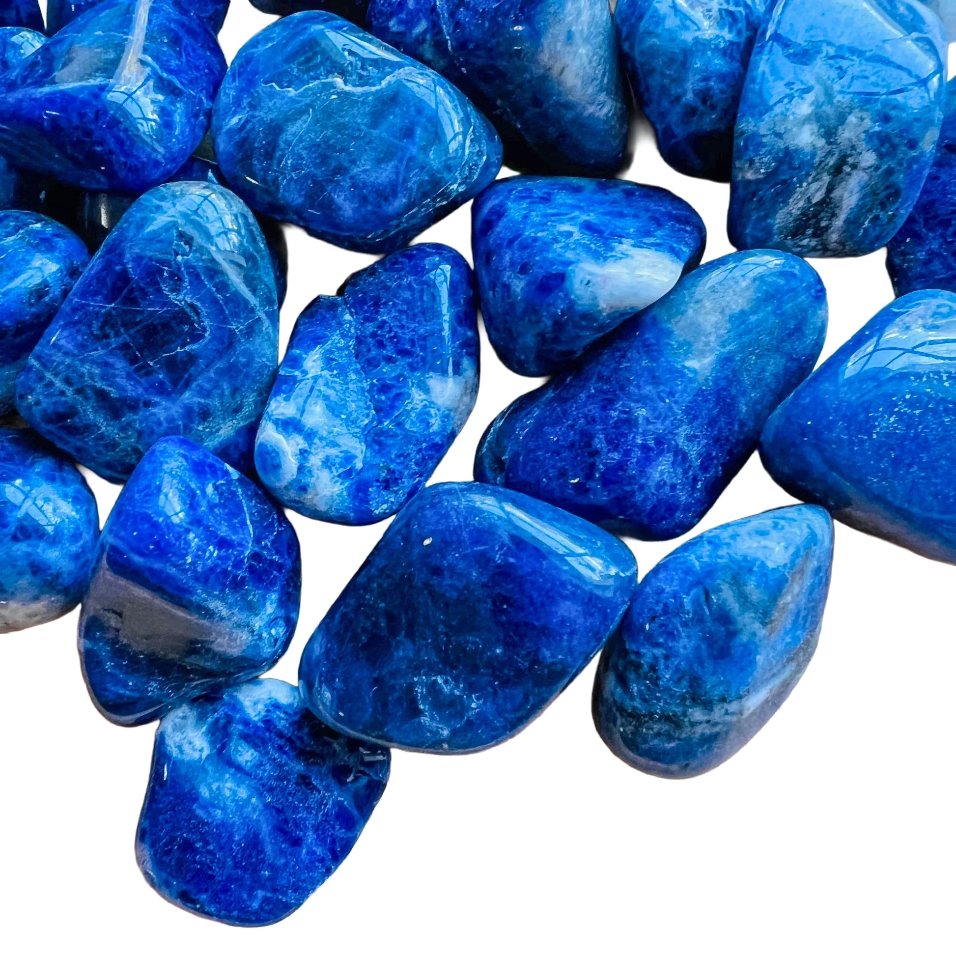Surface detail of Sodalite tumbled stone, showing subtle veining, from Bahia, Brazil.