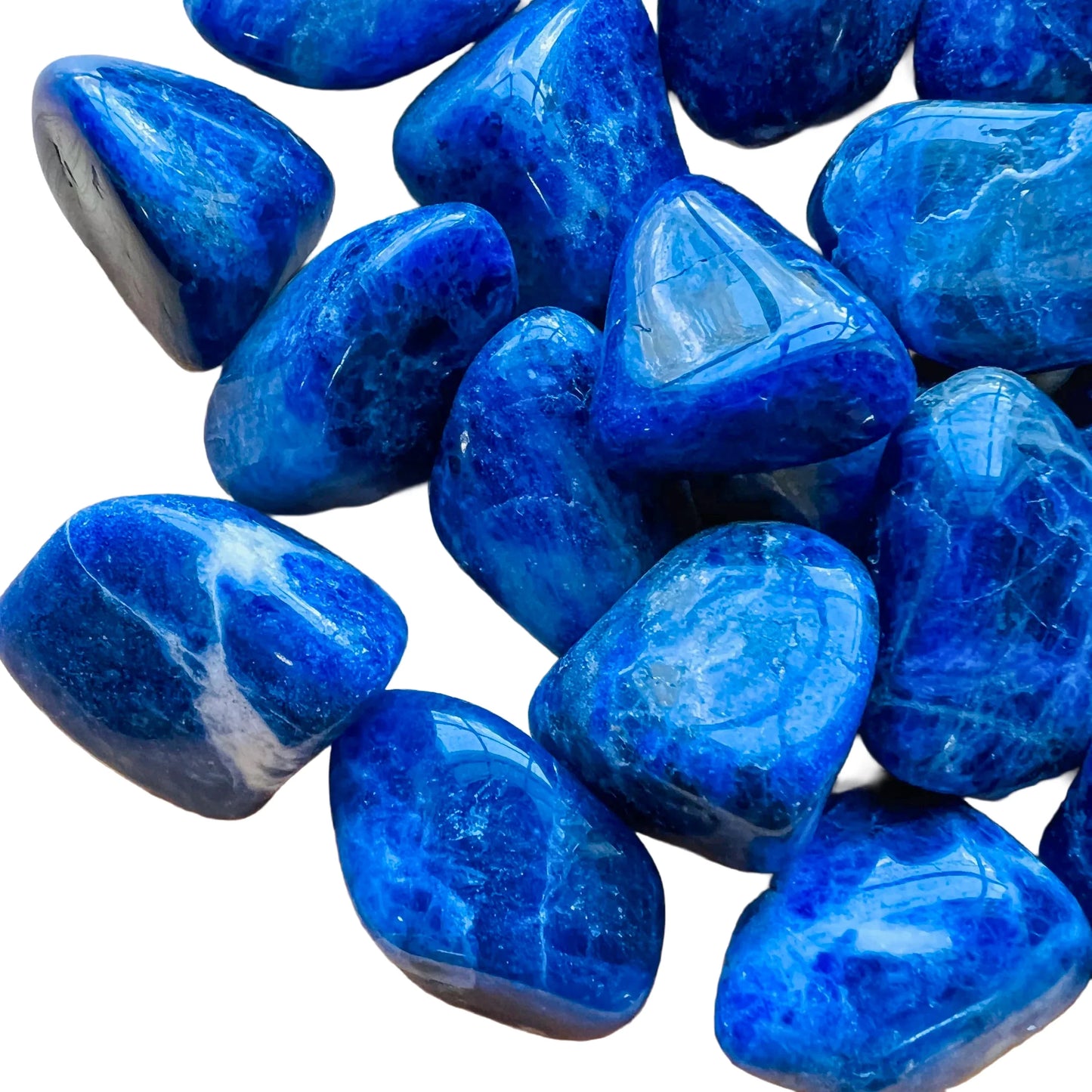 Side perspective of Grade A Sodalite tumbled stone, showing natural variation.