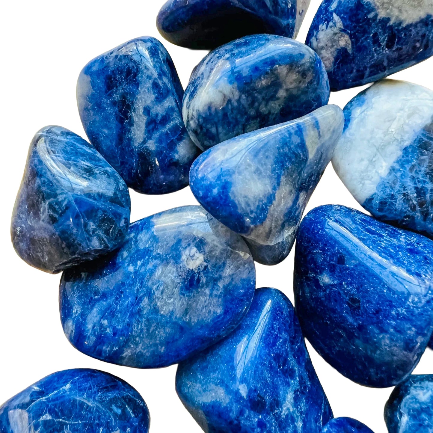 Overhead view of Grade A Sodalite tumbled stone, associated with Focus, showing characteristic color.
