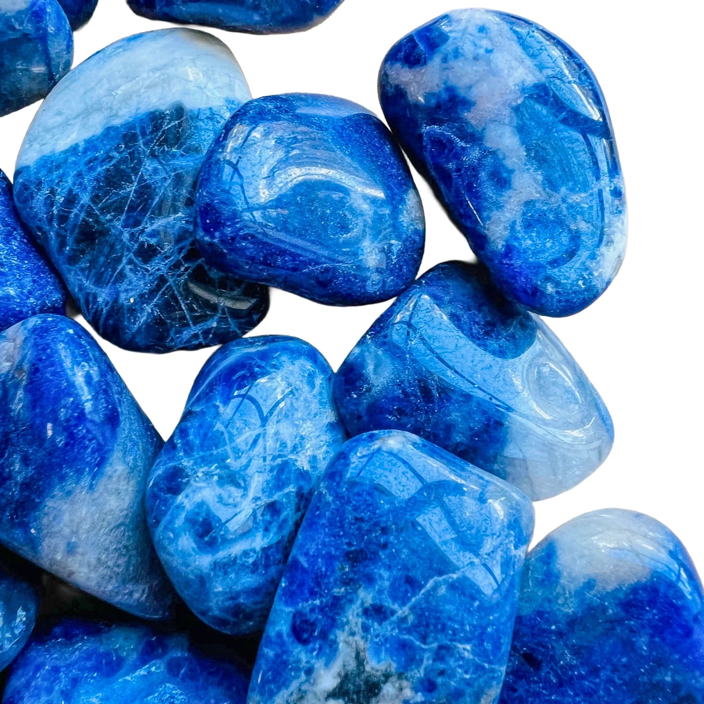 Hand-scale shot of a Sodalite tumbled stone, sourced from Brazil.