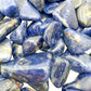 Overhead view of Sodalite tumbled stone, for Focus and Intuition, sourced from Namibia.