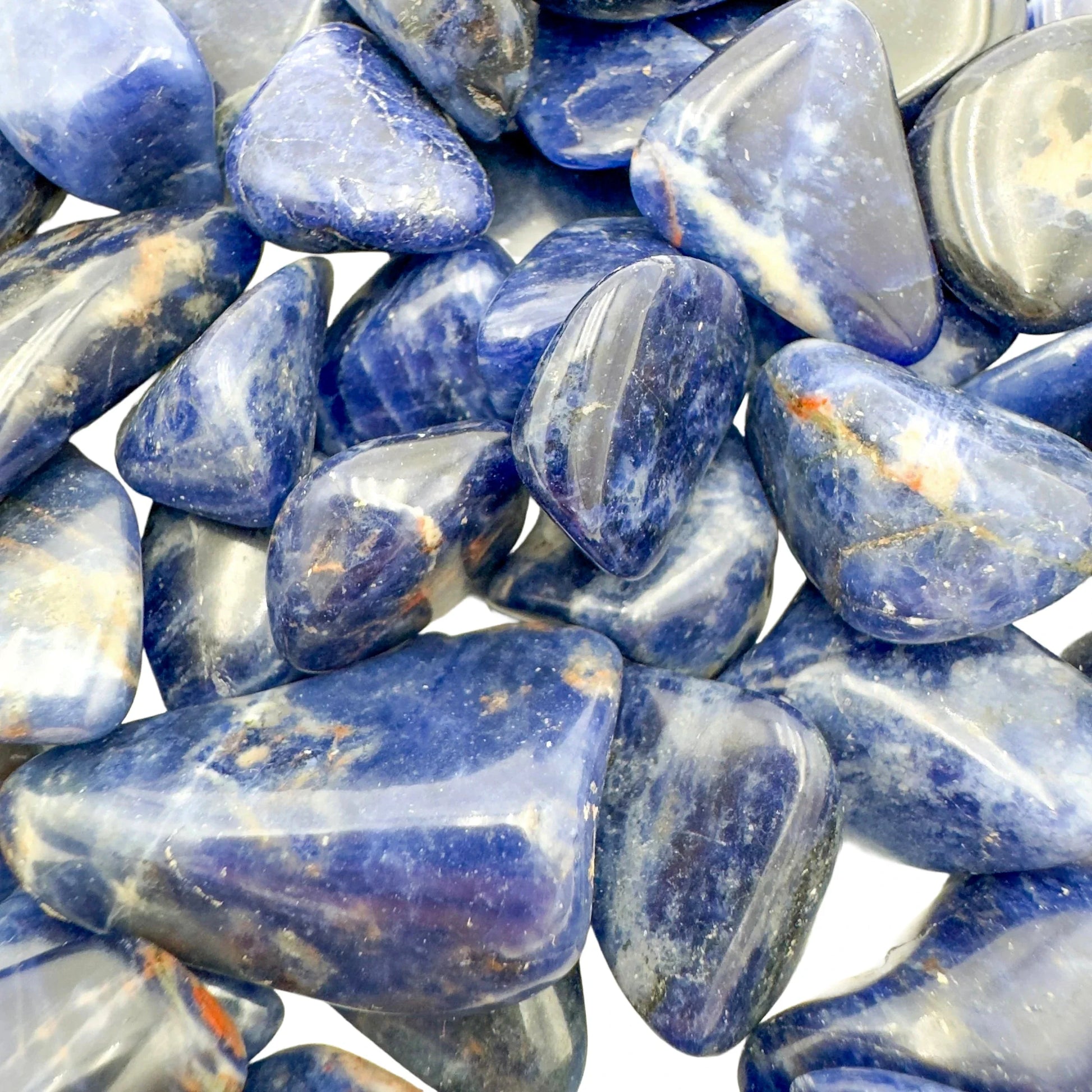Overhead view of Sodalite tumbled stone, for Focus and Intuition, sourced from Namibia.