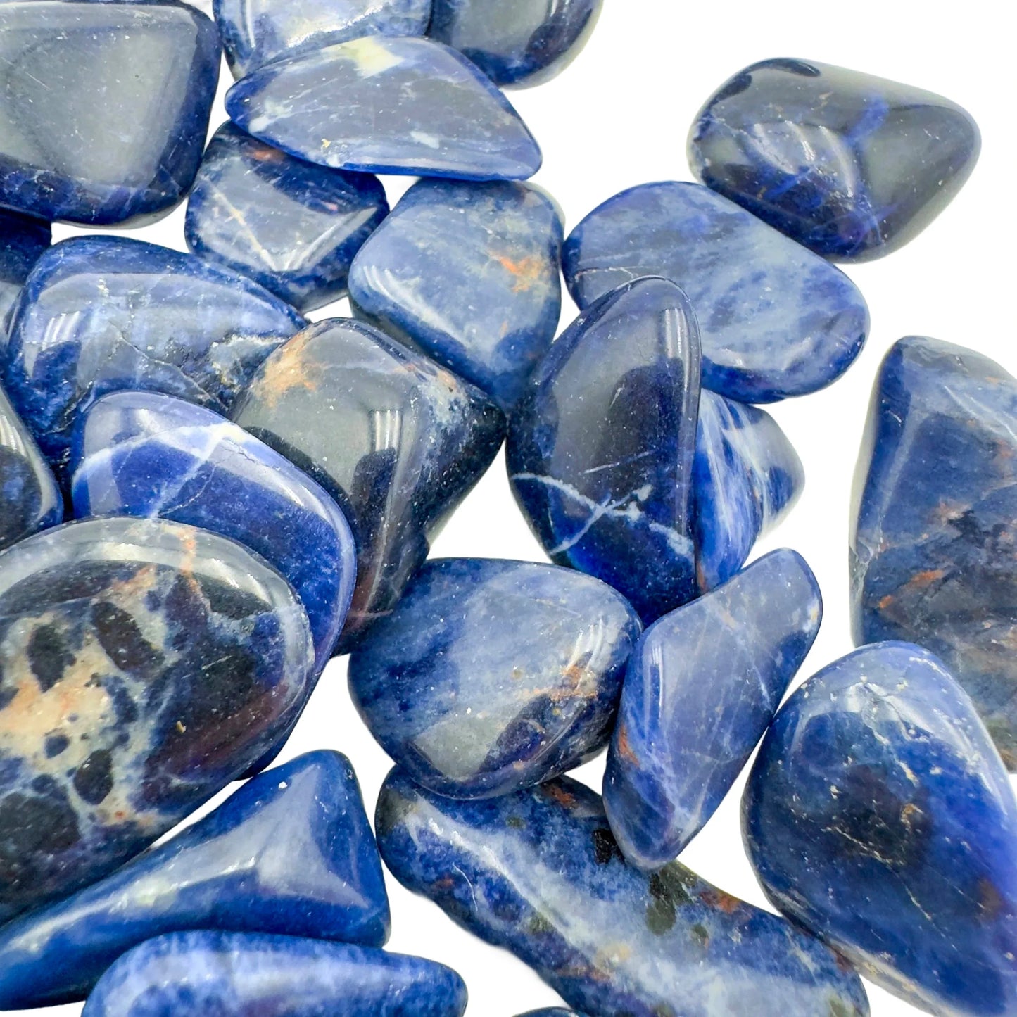 Rear view of Grade AA Sodalite tumbled stone, Namibia-sourced.