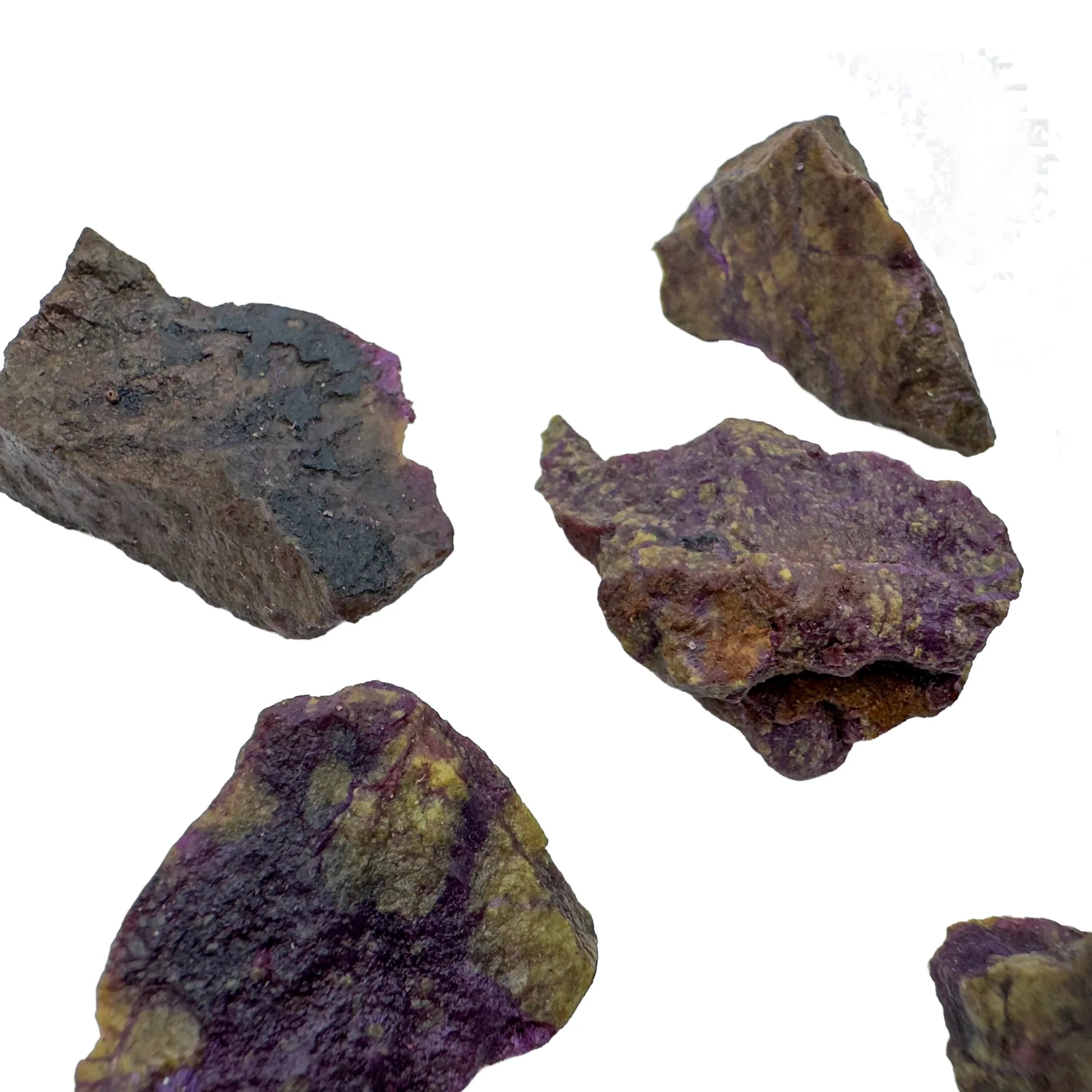 Daylight detail of Stichtite raw crystal, from Mpumalanga, South Africa, linked to Healing, shown for proportion against the hand.