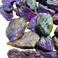 Side perspective of purple Stichtite raw stone, showing honest grain.