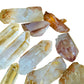Lifestyle view of a single Lemurian Quartz raw point hand-selected from Minas Gerais, Brazil.