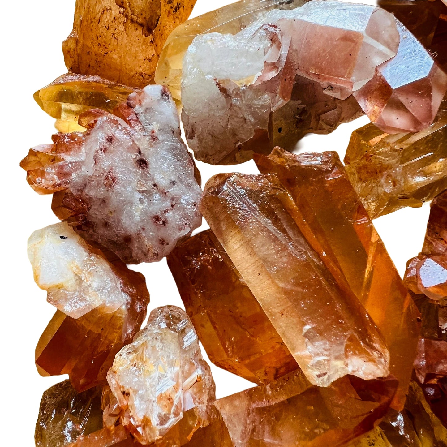 Bird's-eye view of orange Tangerine Quartz raw point, showing untreated character.