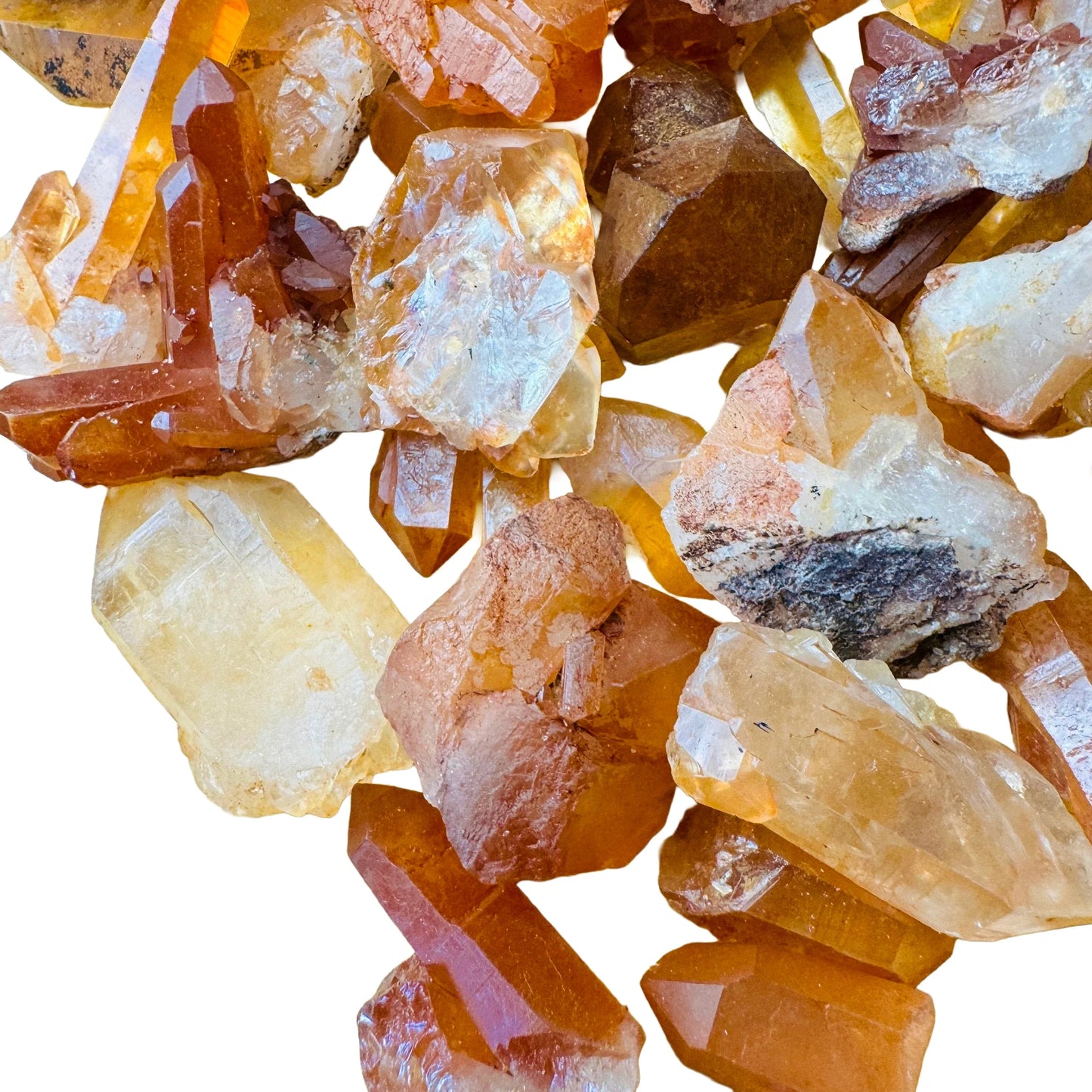 Detail shot of Grade AA Tangerine Quartz point under natural light