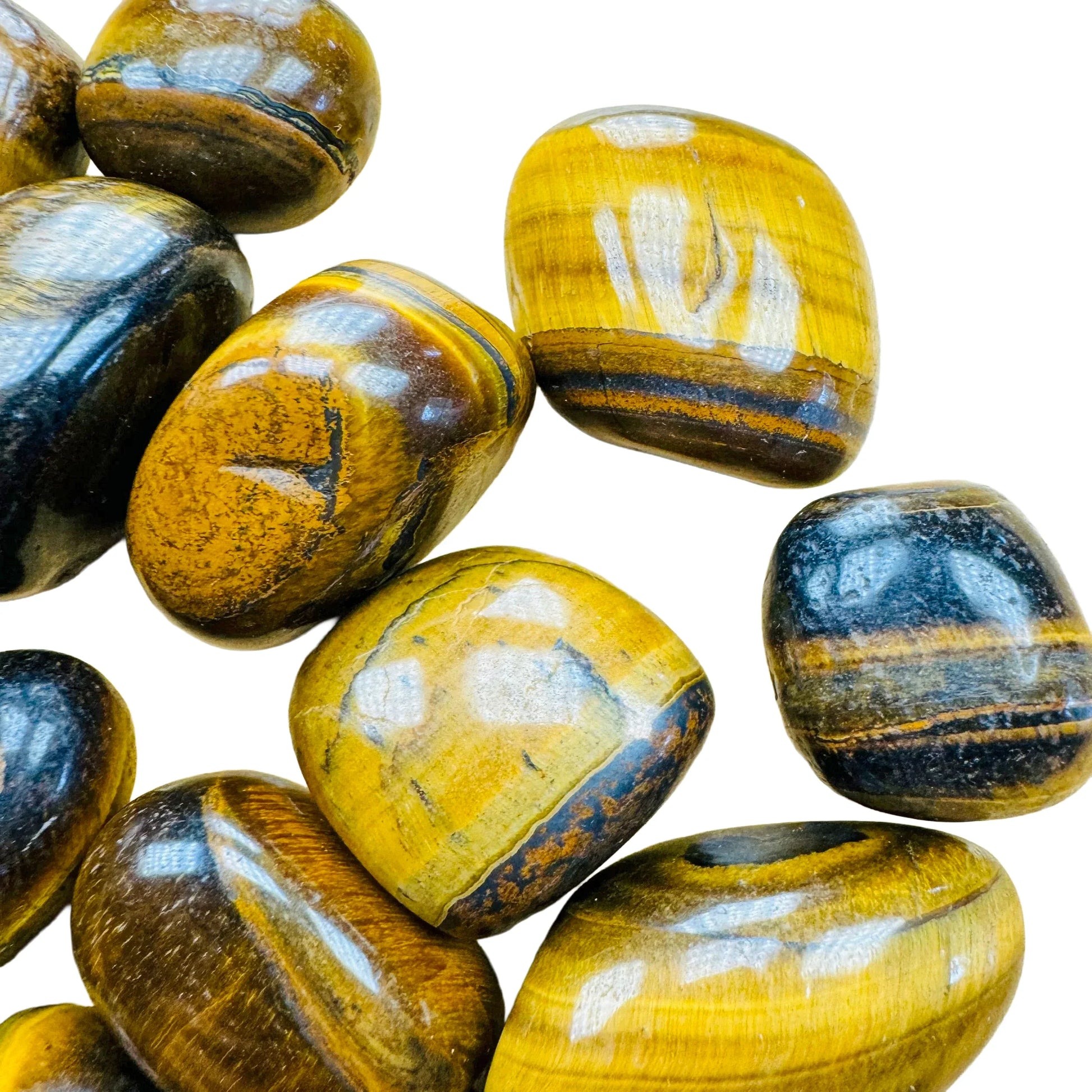 Top-side view of Tiger Eye tumbled stone, hand-selected from Northern Cape, South Africa, showing earthy tone.