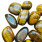 Rear view of Tiger Eye tumbled stone, from Northern Cape, South Africa, showing characteristic finish.