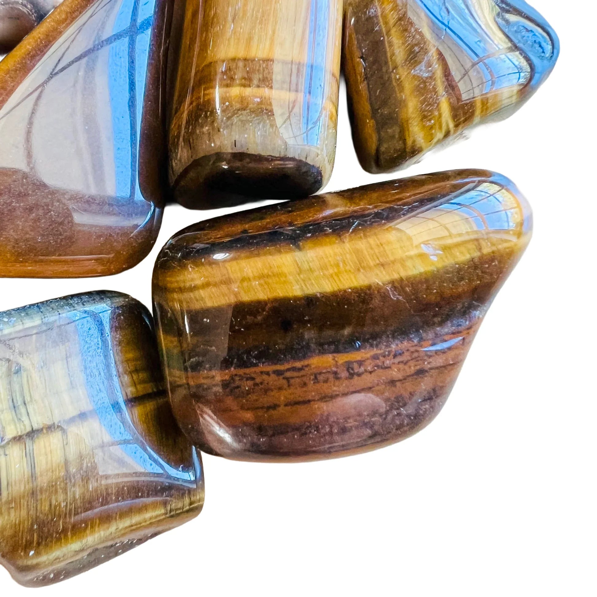 Full profile of Grade A Tiger Eye tumbled stone ready to ship from Beyond Bohemian